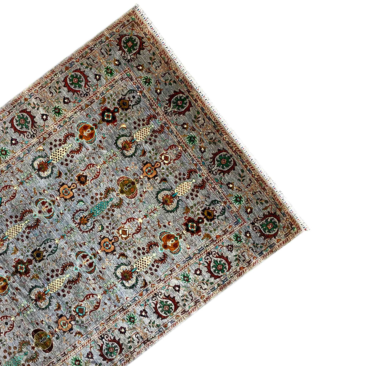 Tea corner with a gray background, green and red ornamental medallions, and bordered edges