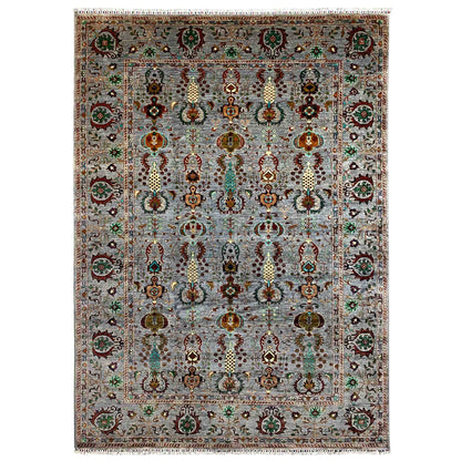 Gray heathered Afghan rug with an ornate pattern and wide border