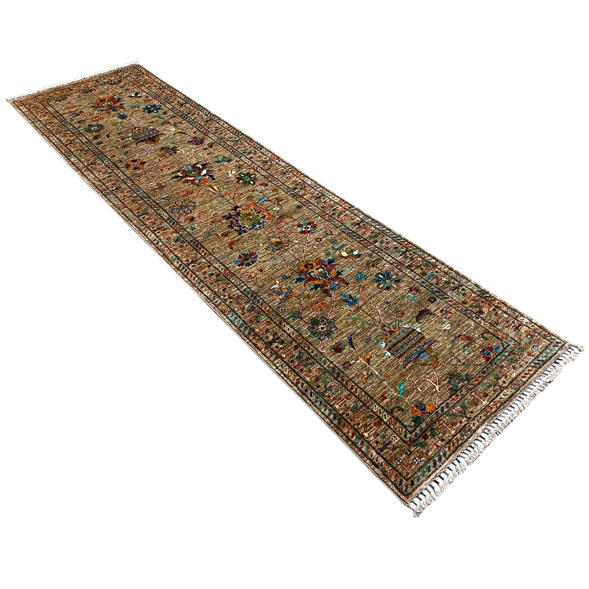 Brown runner rug with colorful patterns, photographed diagonally, rectangular