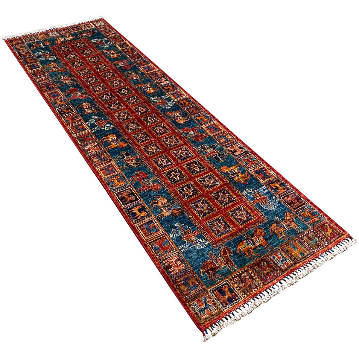 Rectangular runner rug with a blue background, red patterns, and animal motifs