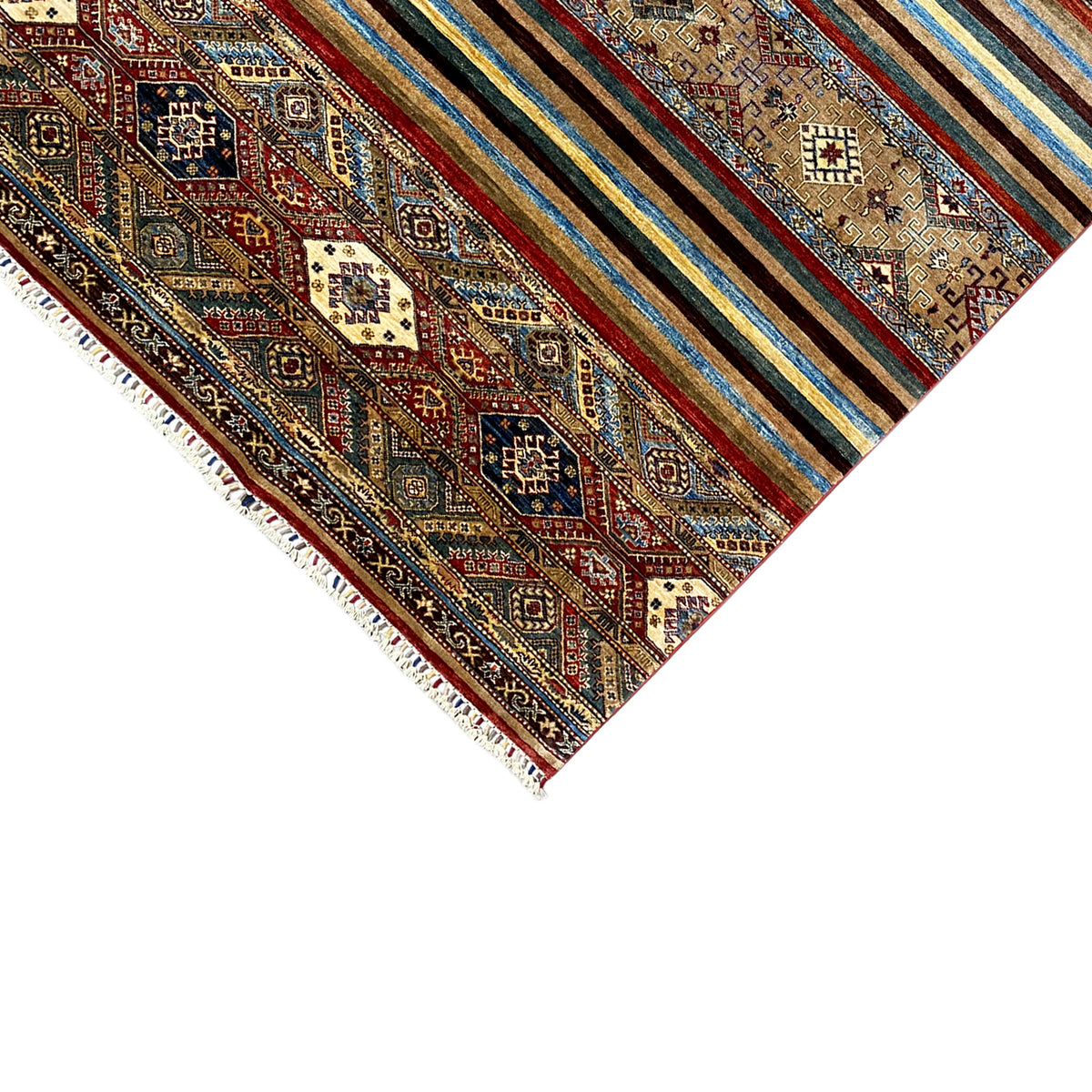 Khorjin rug detail: dense ornamental pattern with stripes and fringe along the corner edge