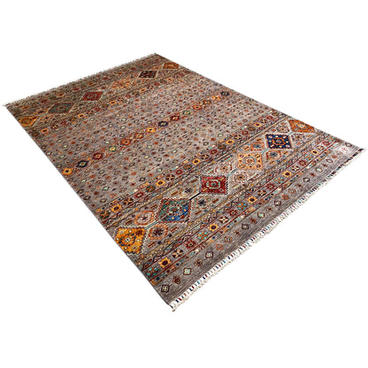 Hand-knotted Khorjin rug in a corner view, multicolored medallions and decorative motifs.