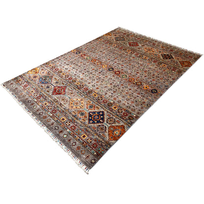 Hand-knotted Khorjin rug, gray-brown with orange accents and colorful patterns.