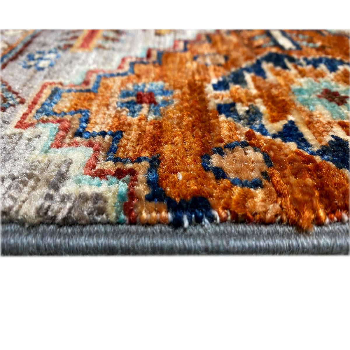 Hand-knotted Khorjin rug, edge with short fringe and an orange-blue pattern in the pile.