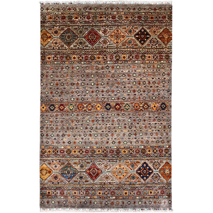 Hand-knotted Khorjin rug with a multicolored geometric pattern and a surrounding border.