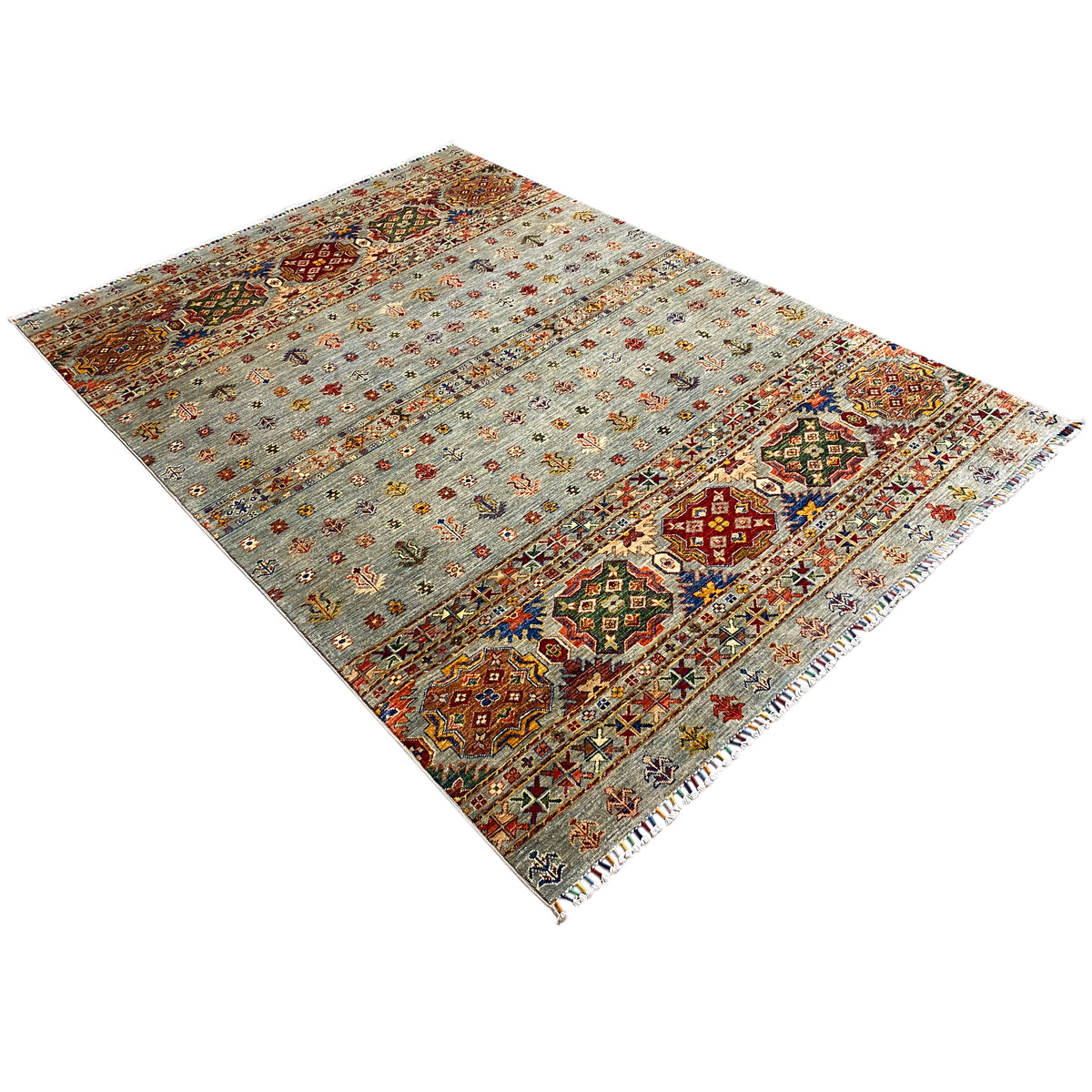 Hand-knotted Khorjin rug with multicolored panels on a light, gray-blue background