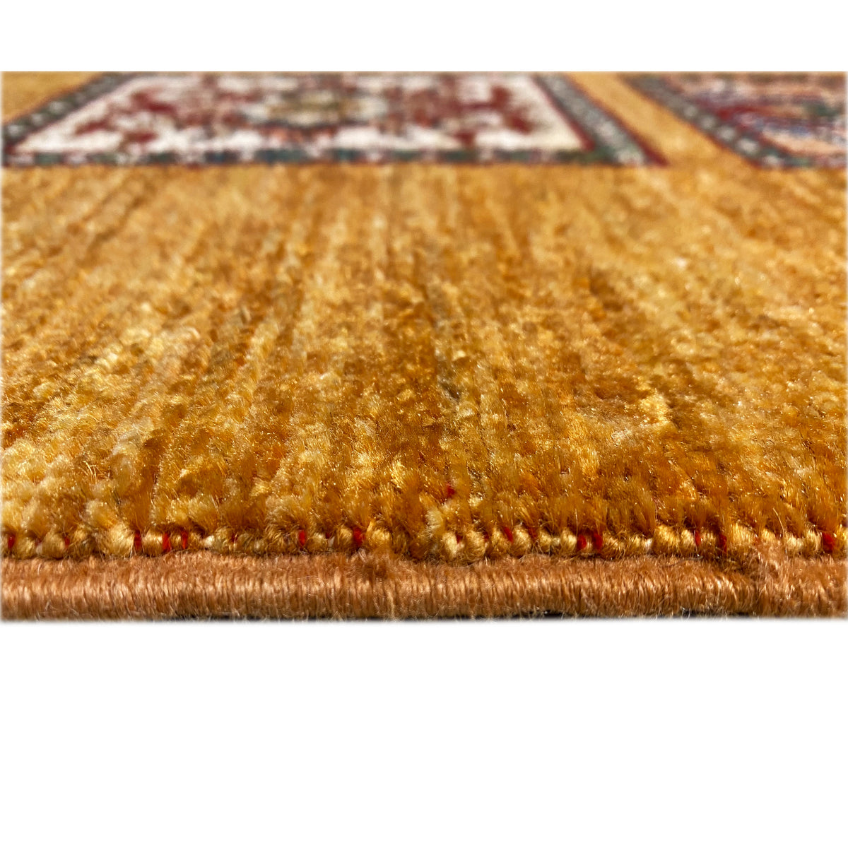 Runner detail: honey-brown pile with a colored border along the edge