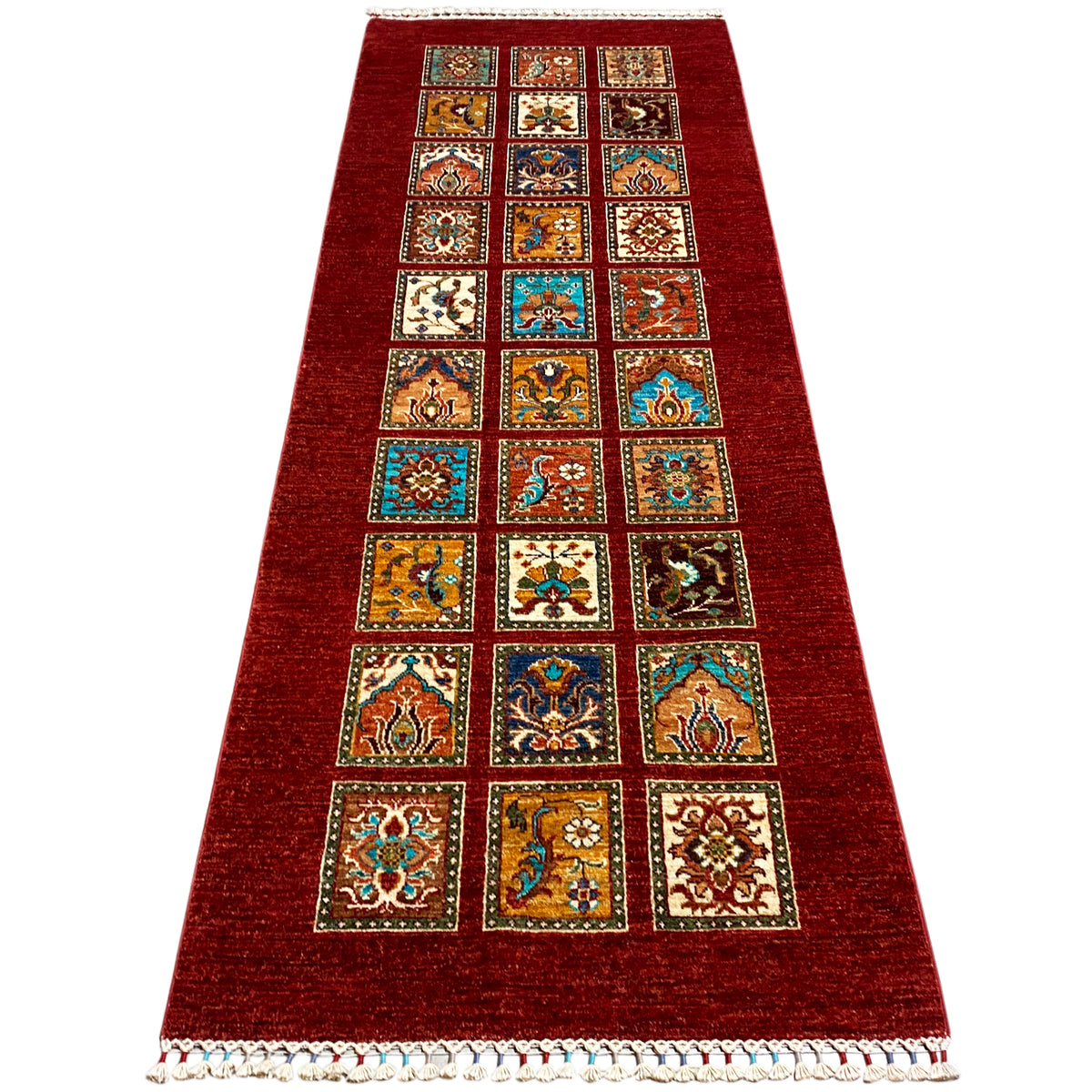 Hand-knotted Khorjin runner with red pile, rectangular pattern of colorful squares