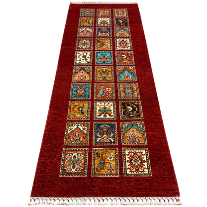 Hand-knotted Khorjin runner with red pile, rectangular pattern of colorful squares