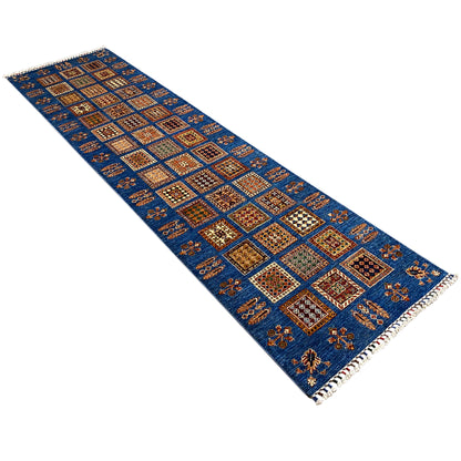Khorjin runner in a diagonal cut, blue patchwork pattern with colorful details