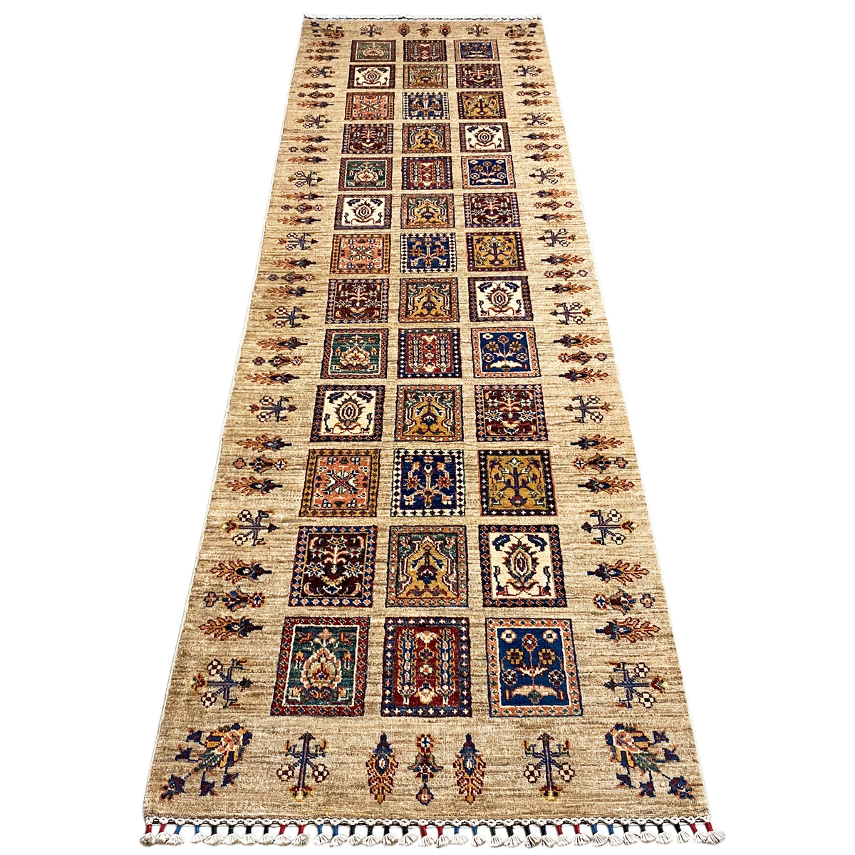 Hand-knotted Khorjin runner with a beige background, square medallions, and decorative border