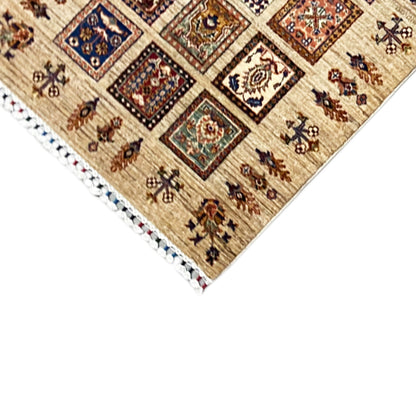 Hand-knotted Khorjin runner edge with decorative fringes and patterned squares
