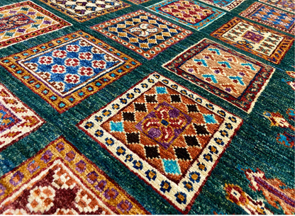 Close-up of the Khorjin runner: colorful square mosaic on a dark green background