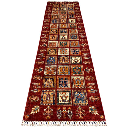 Bordeaux-colored Khorjin runner with geometric tile patterns and fringes, hand-knotted.