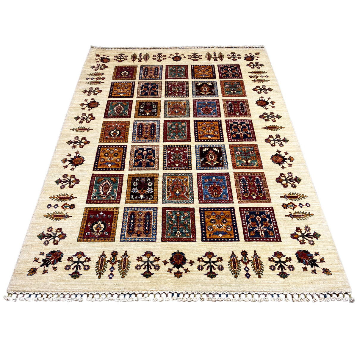 Khorjin rug in a patchwork design with colorful diamonds and a surrounding border.