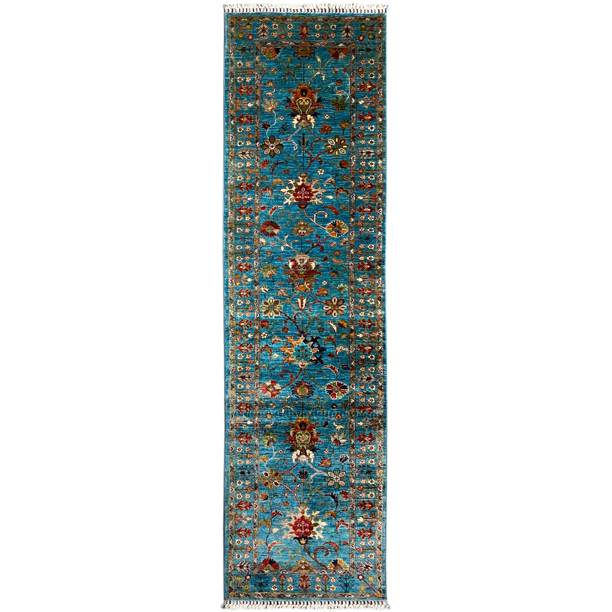 Hand-knotted runner with a blue floral rug pattern, side border, and fringes