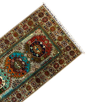Khorjin runner corner with decorative border, multicolored medallions, and tassels