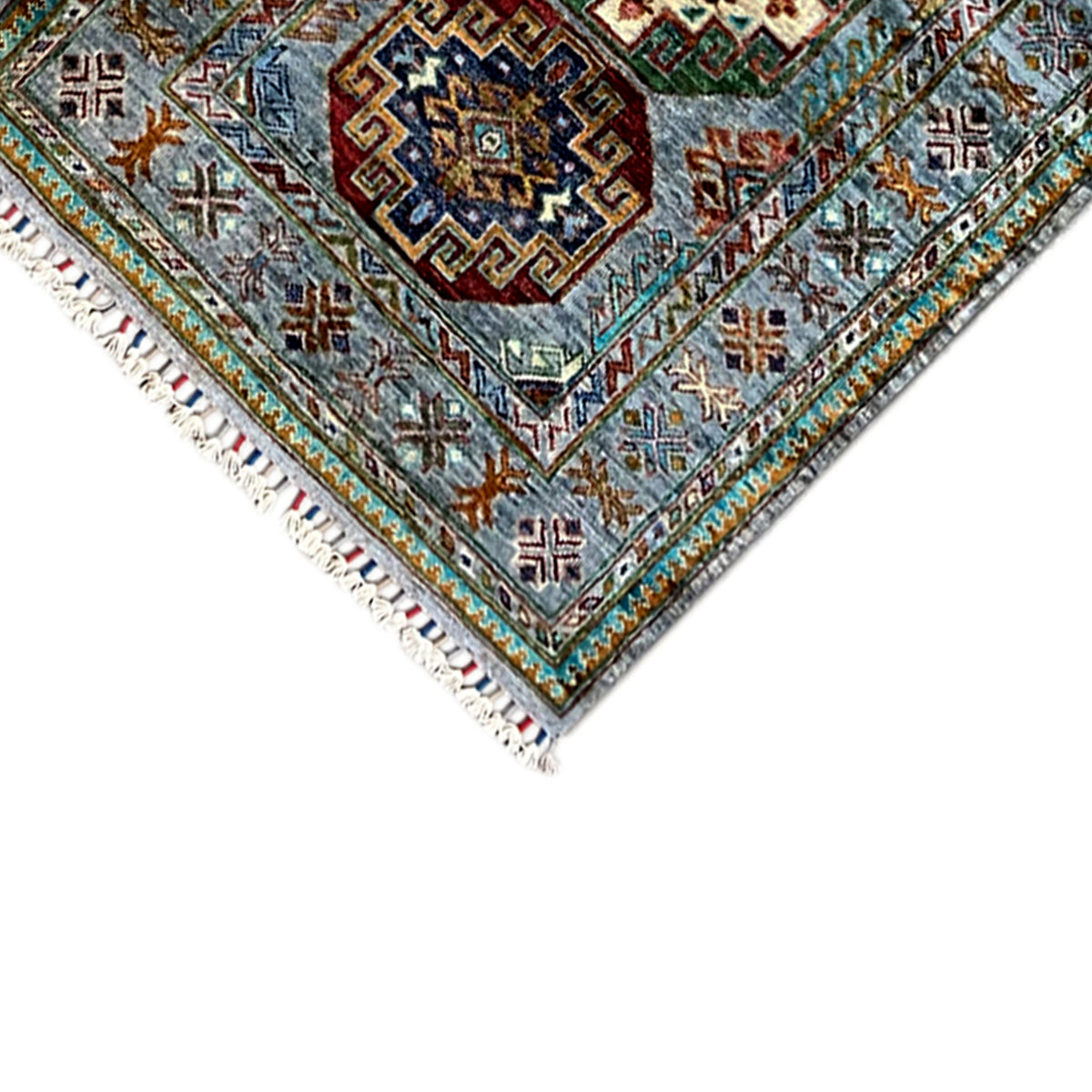 Hand-knotted Khorjin runner, close-up of corner with fringes and decorative border