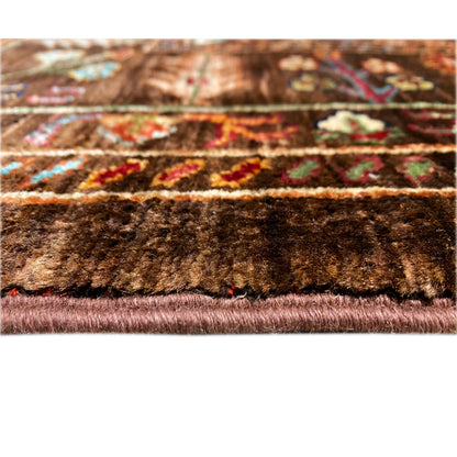 Edge detail of the hand-knotted Khorjin rug with fringes and a thick pile texture