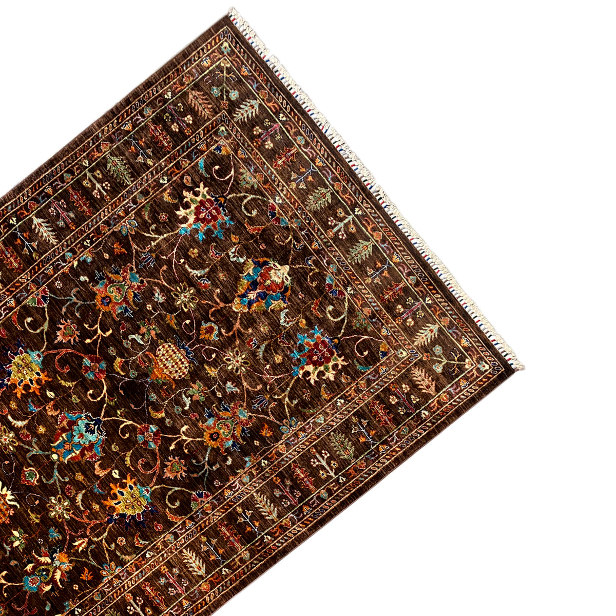 Corner view: Hand-knotted Khorjin rug with an ornamental border and colorful motifs