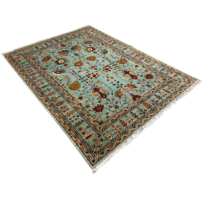 Khorjin rug, turquoise field with central medallions and colorful floral patterns