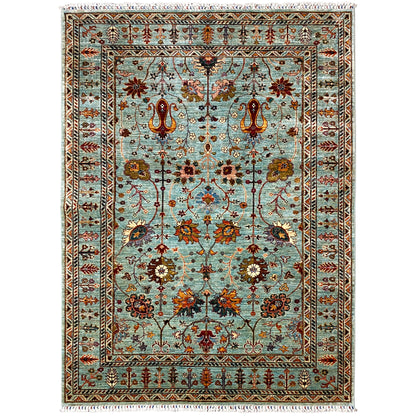 Hand-knotted Khorjin rug with a turquoise background and floral ornaments, rectangular