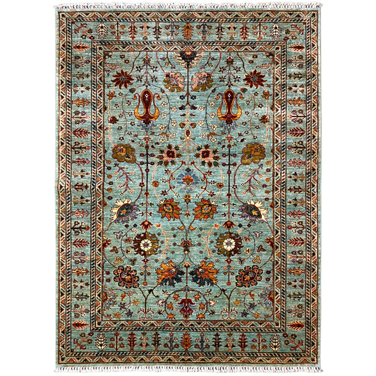 Hand-knotted Khorjin rug with a turquoise background and floral ornaments, rectangular