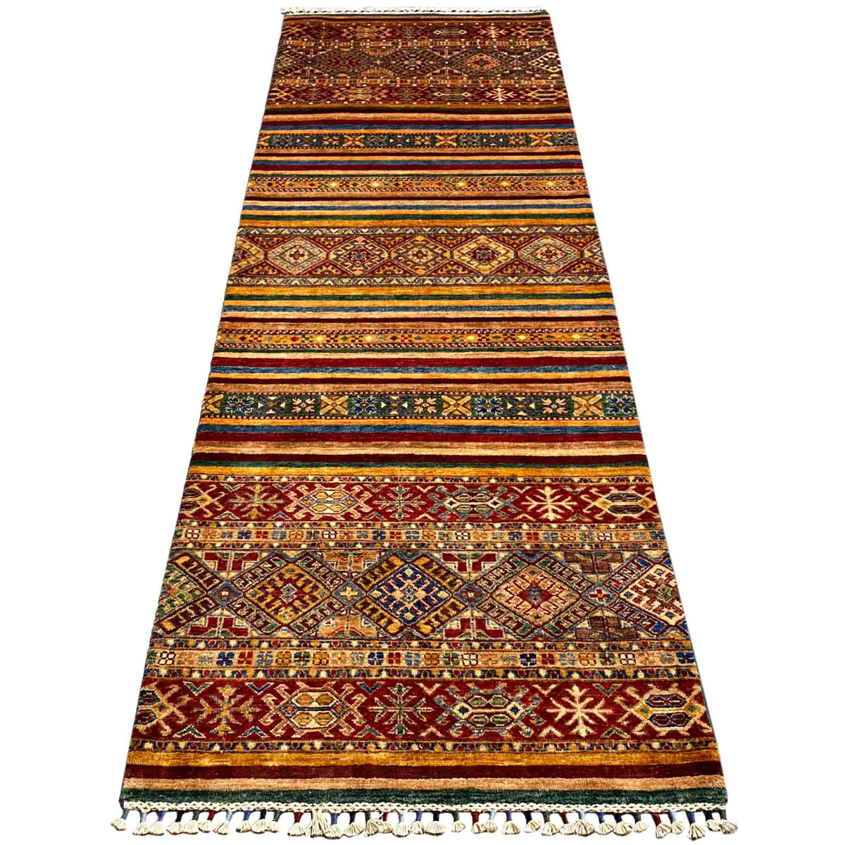 Multicolored runner rug with geometric row patterns and fringes