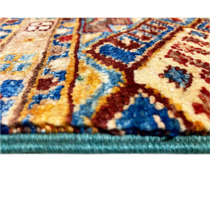Detail of the runner rug: woven patterns in blue, red, and yellow