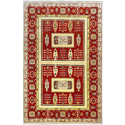 Khorjin rug with a red background, cream-colored border, and central motif panels