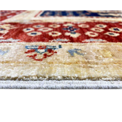 Close-up: Khorjin rug edge with pile texture and multicolored pattern