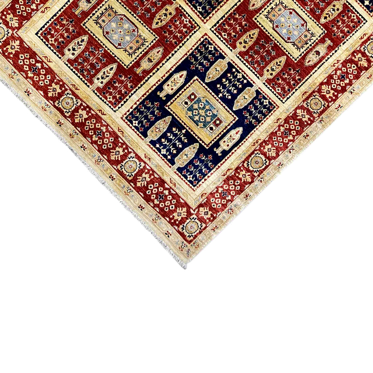 Khorjin rug corner with border and geometric motifs in red, blue, and cream