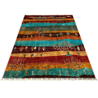 Khorjin rug, wide view: landscape and tree of life in turquoise, red, and ochre