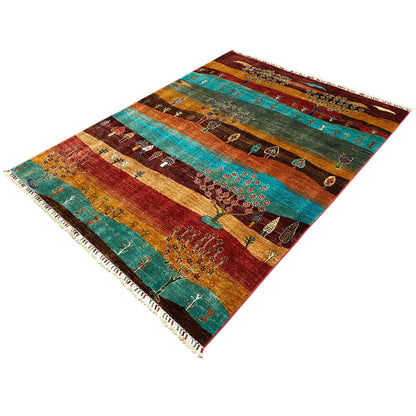 Khorjin carpet laid out: colorful stripes with tree and landscape ornaments