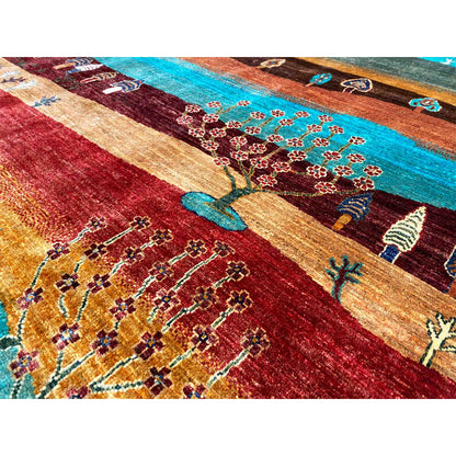 Khorjin rug detail view: Tree of Life and floral ornaments in red and turquoise