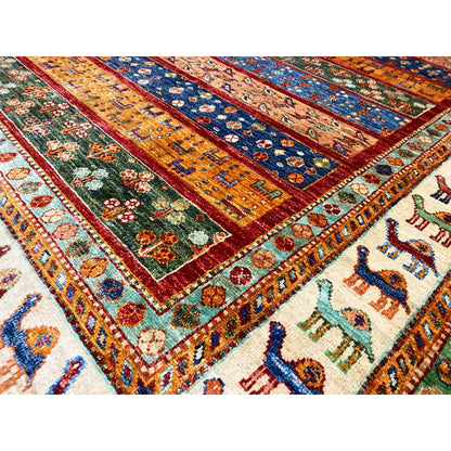 Close-up: Detail of the carpet strips with floral ornaments and camel motifs