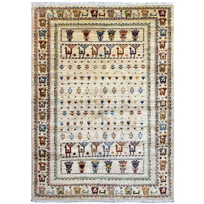 Rug with a light background and multicolored tribal motifs in the border