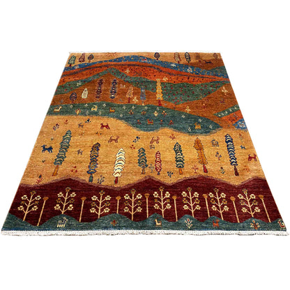 Rectangular landscape rug in shades of brown, blue, and green with patterned panels and fringes.