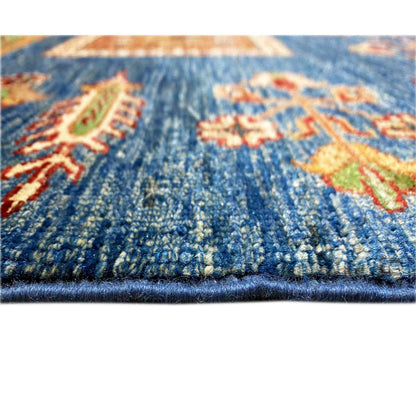 Blue carpet: close-up of the pile surface with pattern details