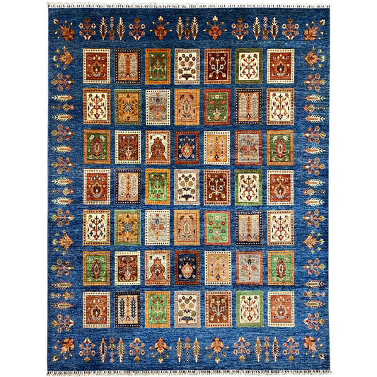 Blue rug with Khorjin panel design, colorful squares, and fringes