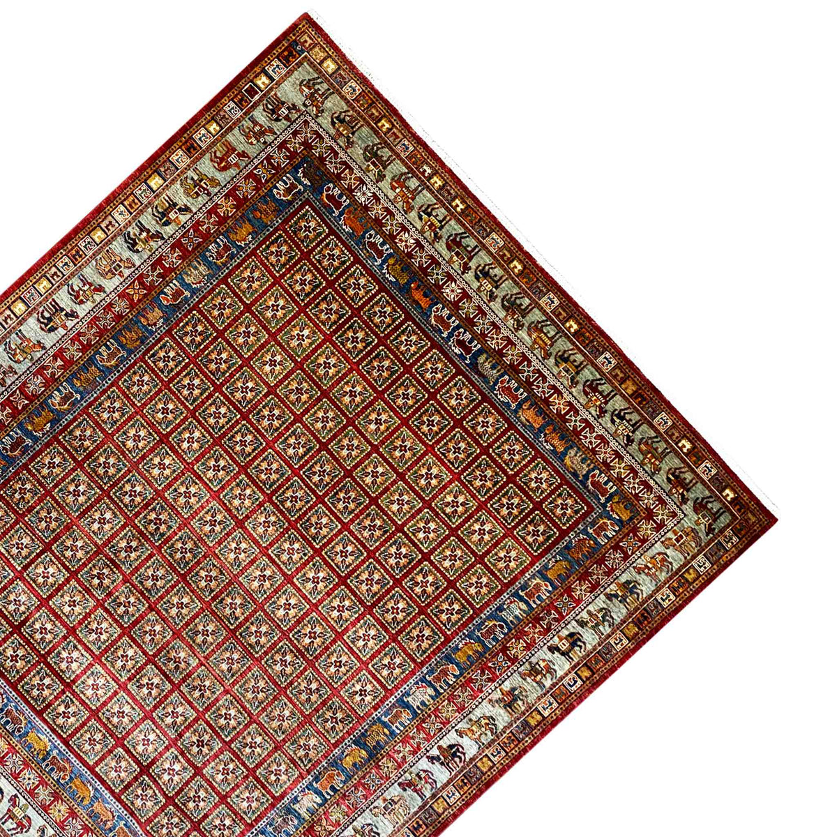 Khorjin rug at an angle: red diamond pattern with a blue border and surrounding bands