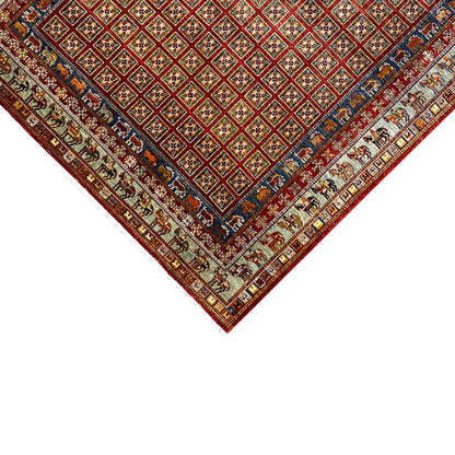 Corner of the Khorjin rug: red field, blue central band, and colorful borders along the edge