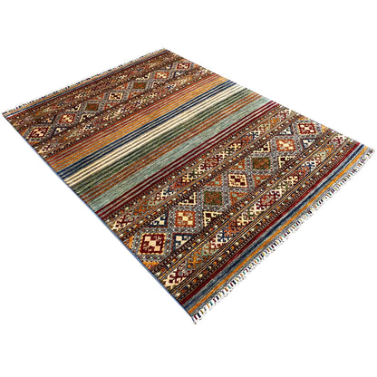 Khorjin rug in diagonal view: diamond motifs, stripes and fringes