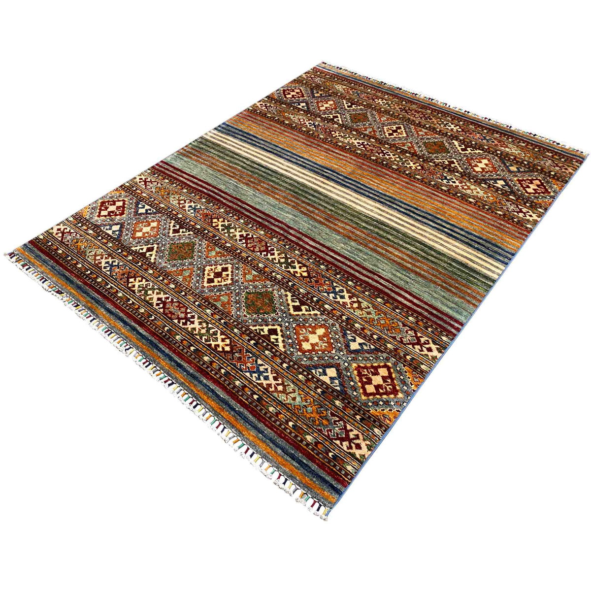 Khorjin rug at an oblique angle with a row of diamonds, stripes, and fringes