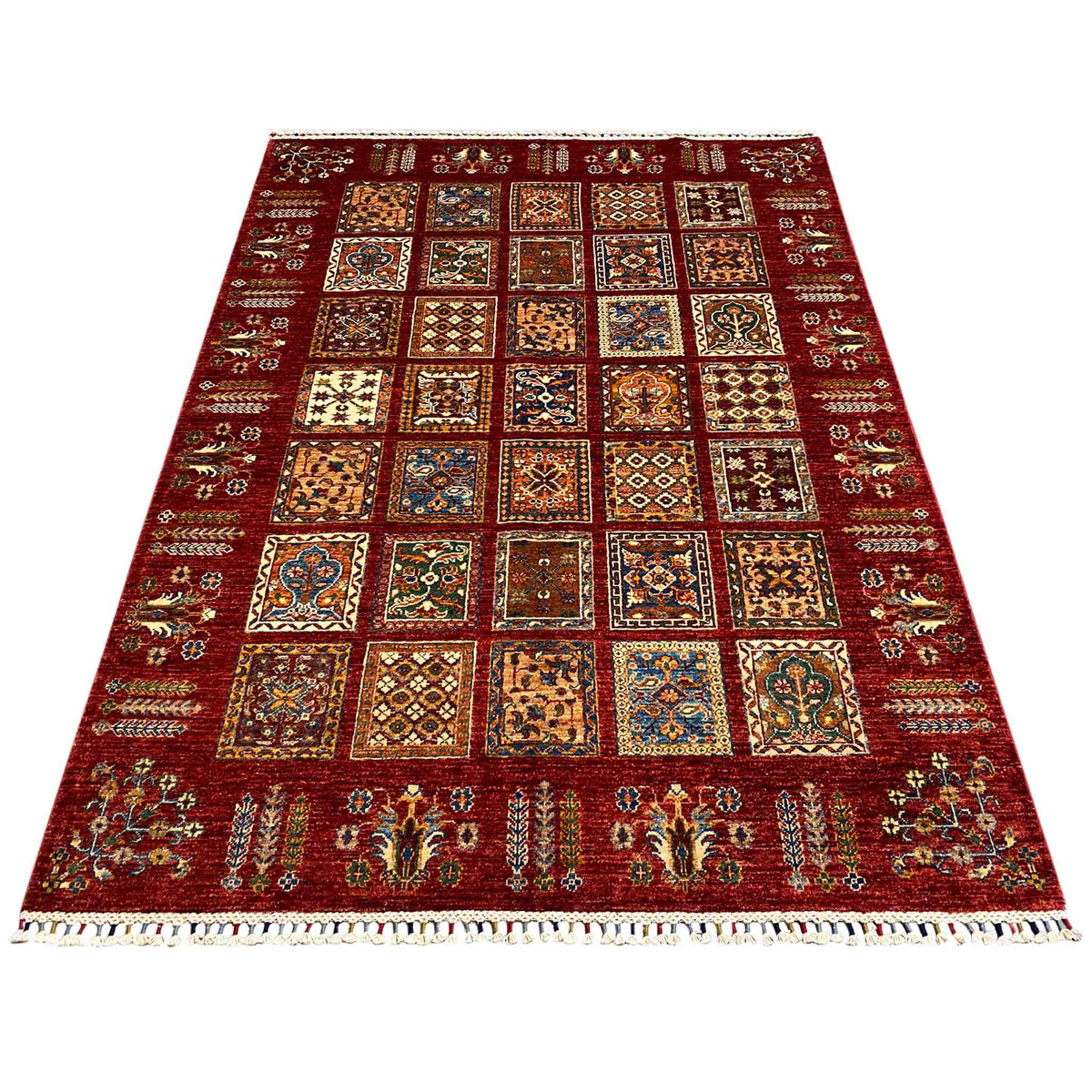 Red rug with square vintage mosaic patterns and decorative border, rectangular