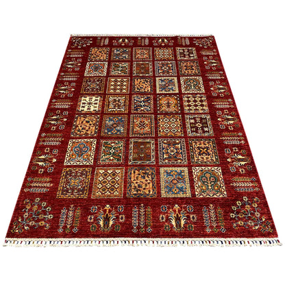 Red rug with square vintage mosaic patterns and decorative border, rectangular