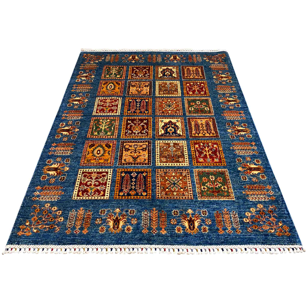 Rectangular blue Khorjin rug with a grid of ornamental squares and a surrounding border