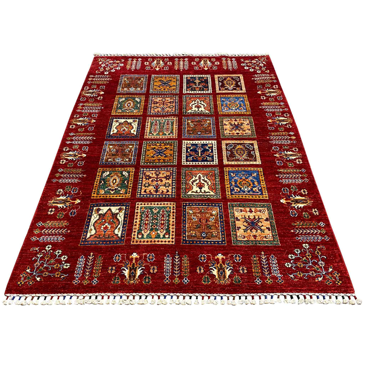 Red carpet with a central checkered pattern of colorful squares and borders, fringes
