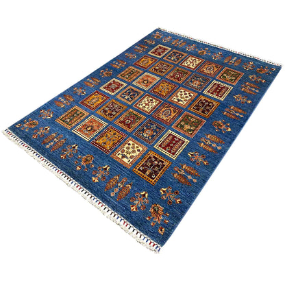 Azure blue rug with a central grid of square motifs and a decorative border frame