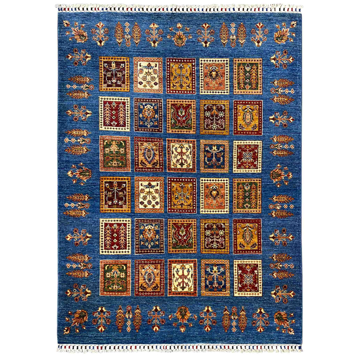 Rug with azure-blue panel design and square ornaments, colorful border, fringes